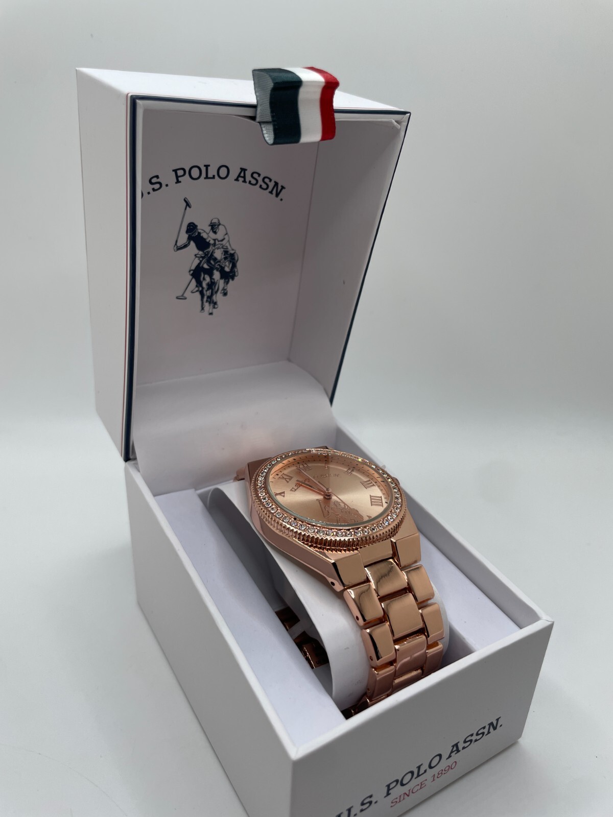 U.S. Polo Assn. Womens Rose Gold Tone Roman Numerals Analog Round Wristwatch