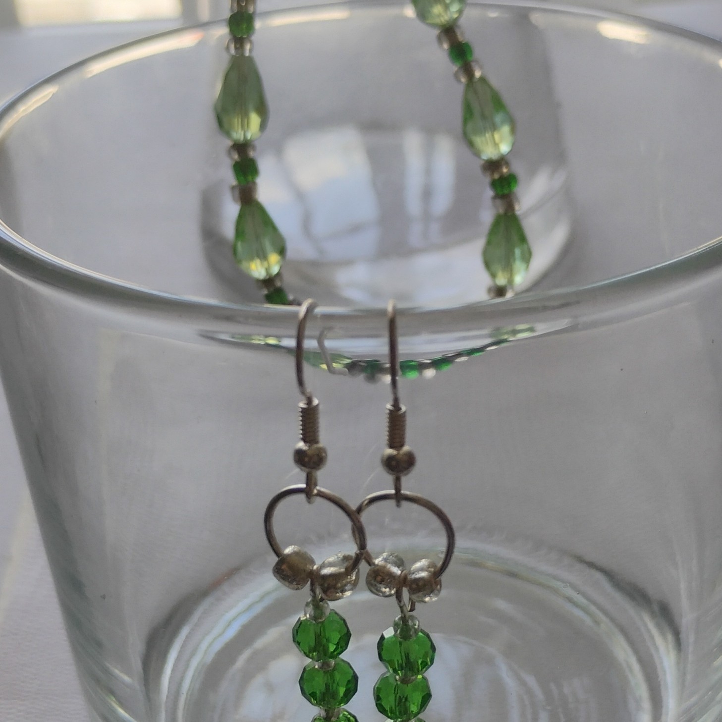 All Elegant Crystals necklace earrings Green briolette Glass Silver metal