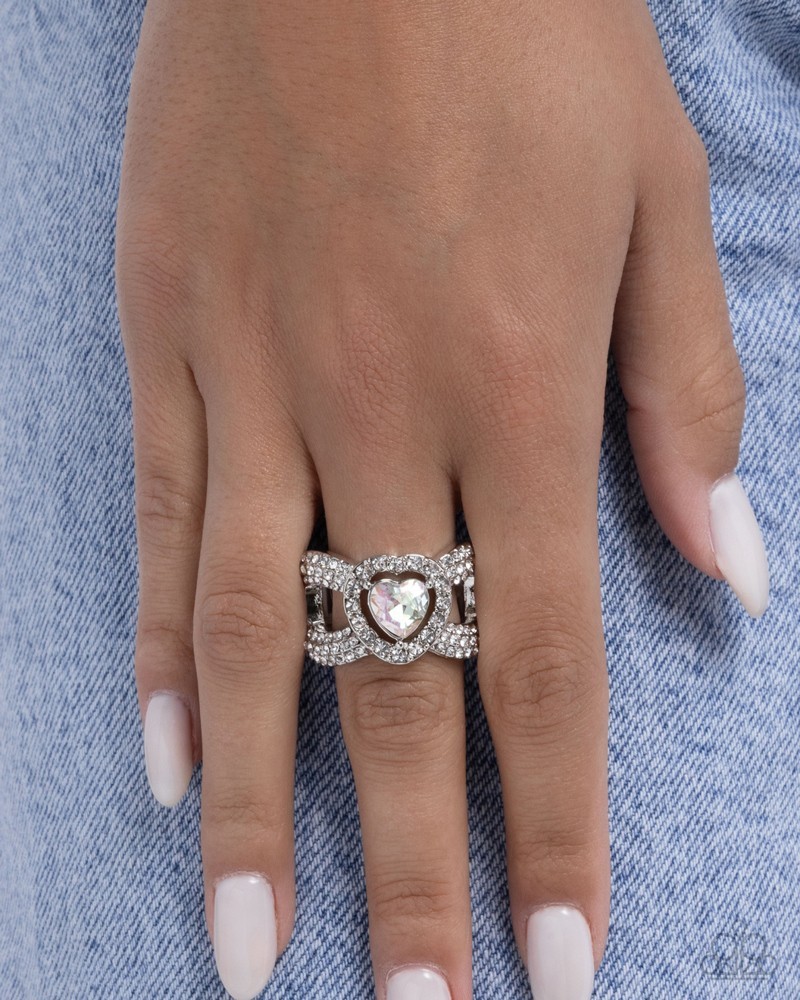 Paparazzi Lovely Levels – White – Rhinestones – UV Iridescent Gem – Silver Criss