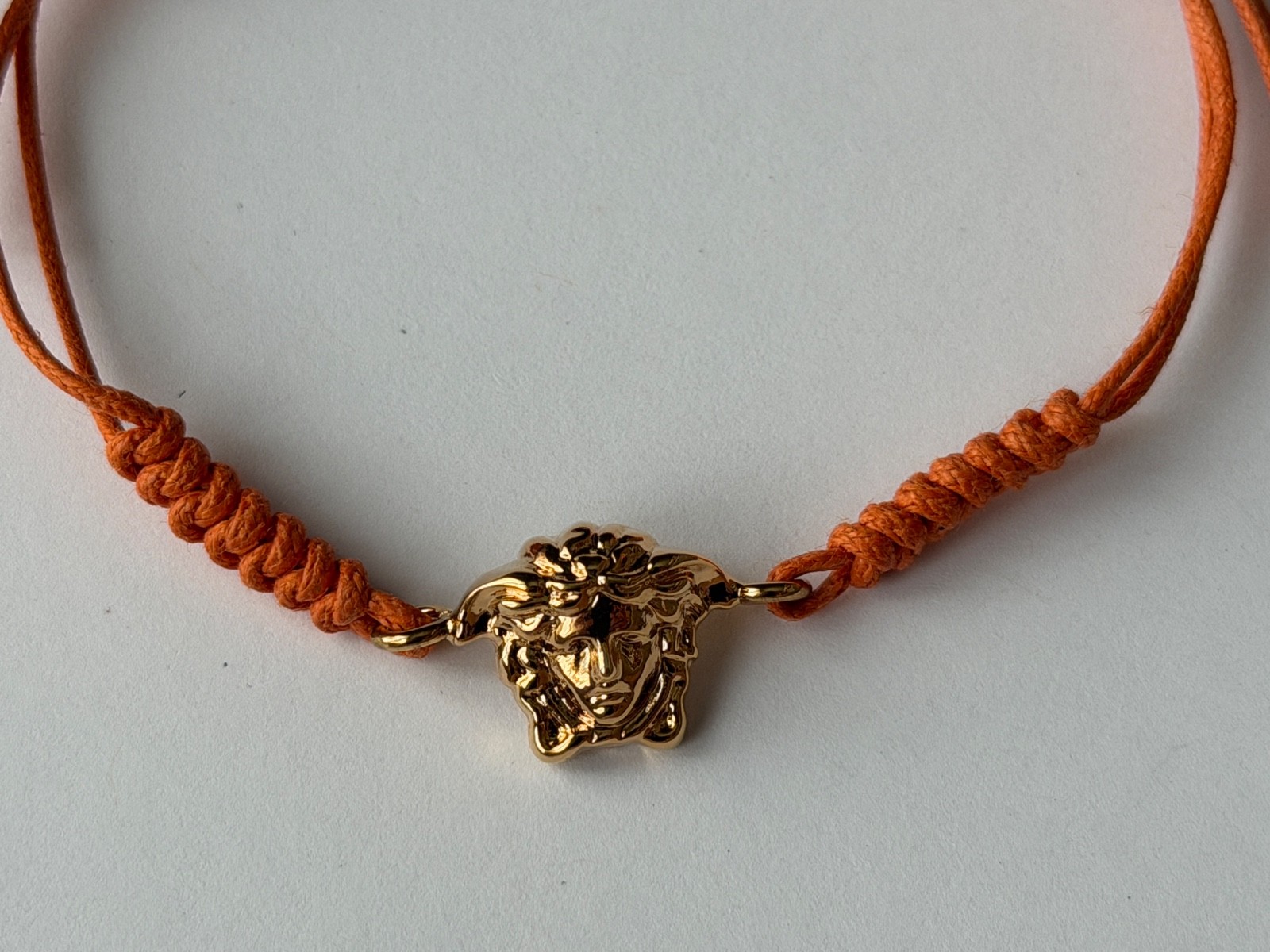 NWT Versace Medusa Head 3D Logo Charm Gold Orange Drawstring Cord Bracelet $495