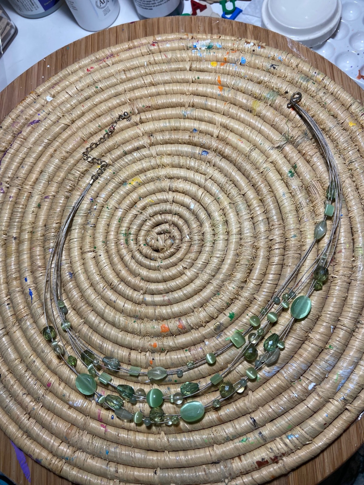 Invisibly strung light medium green color stones 3 Strands