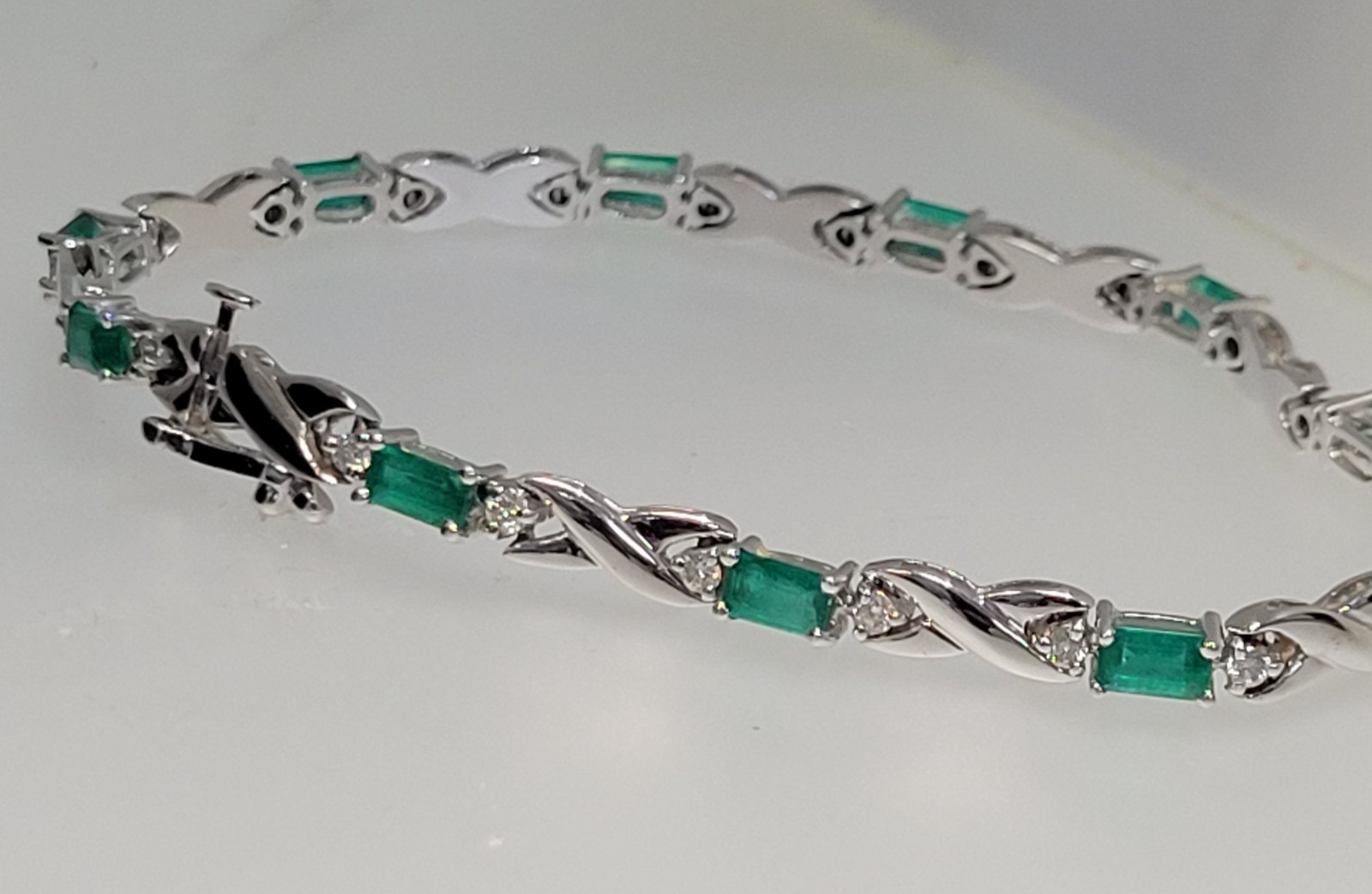 18k White Gold 3.3 cttw Gorgeous Emeralds and .63 cttw Diamond Bracelet