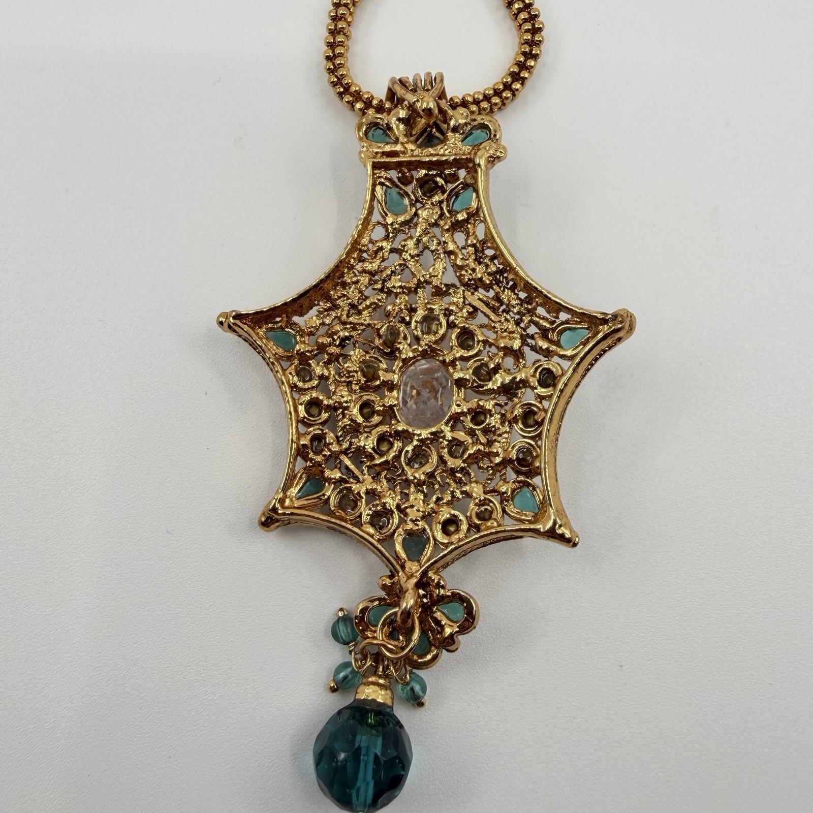 Gold Tone Ornate Multi Pointed Pendant Accented Clear Teal Rhinestone 16”
