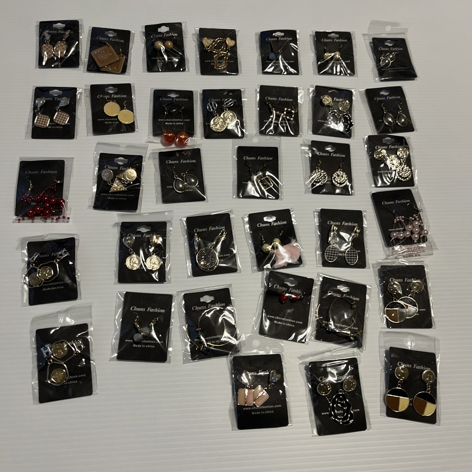 Lot of 140 Chuns Fashion Jewelry Earrings with different designs and colors