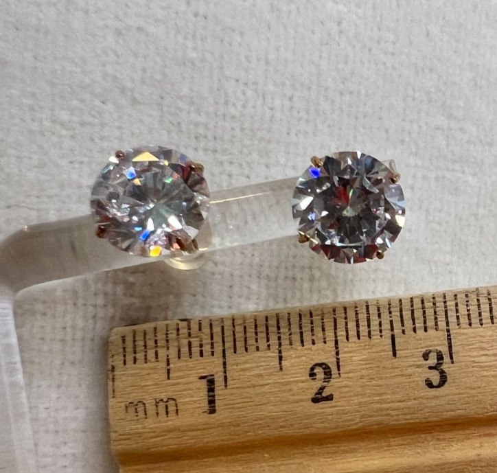 Bella Luce Cubic Zirconia 9.00ctw round 10K yellow gold stud earrings