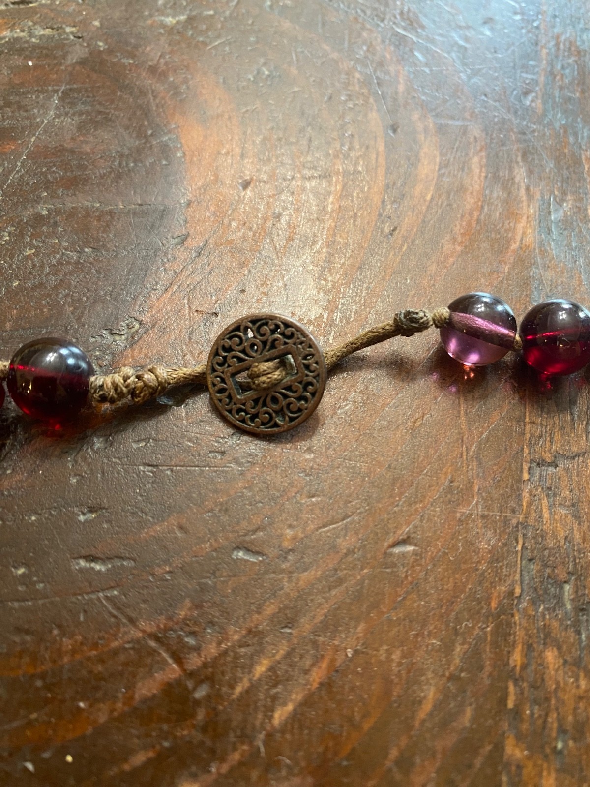 Vintage burgundy/purple/red ombre glass necklace with loop clasp and cording