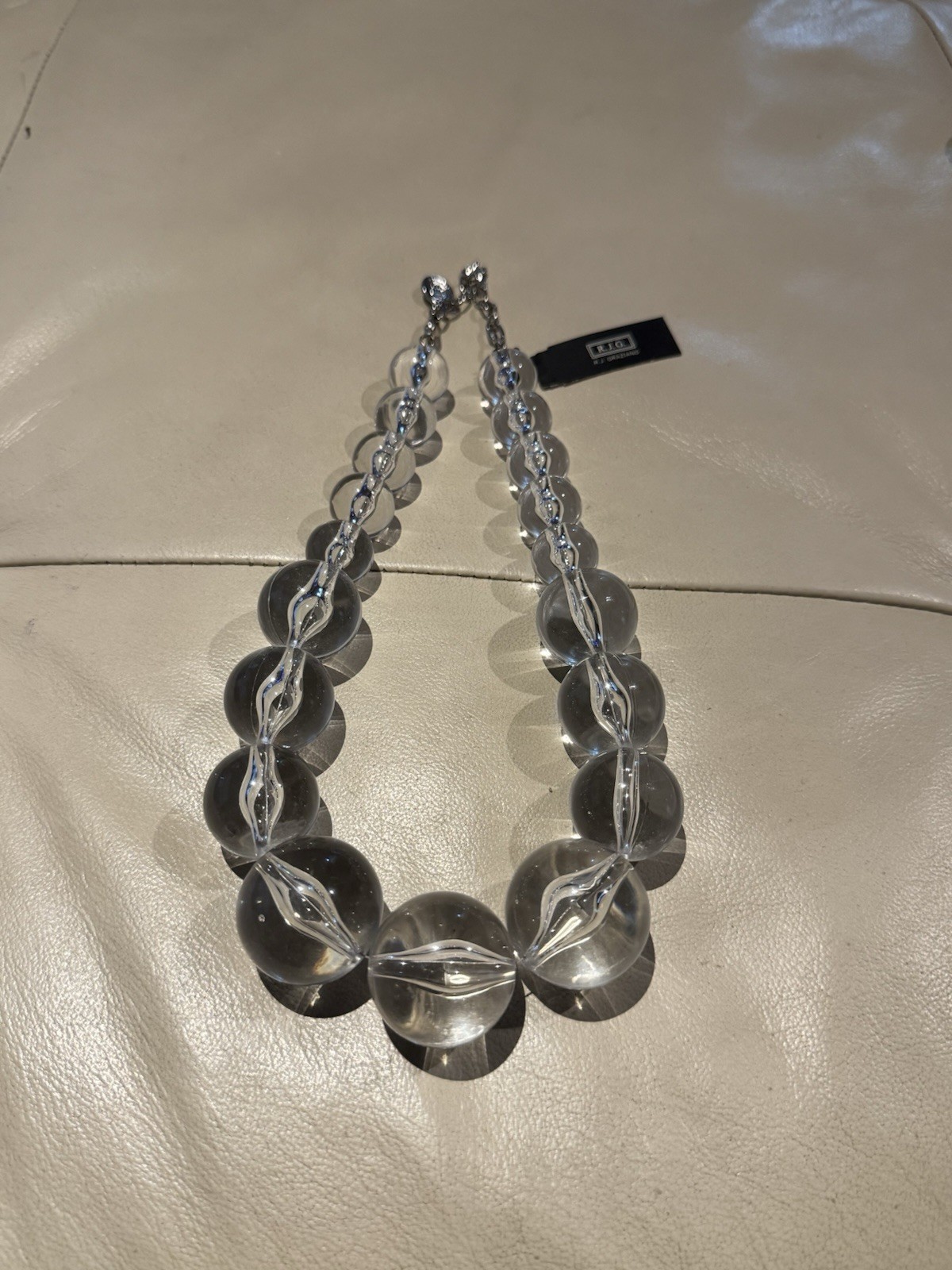 R.J.G. (RJ Graziano) Clear Acrylic Disc Beaded Statement Necklace Adjustable