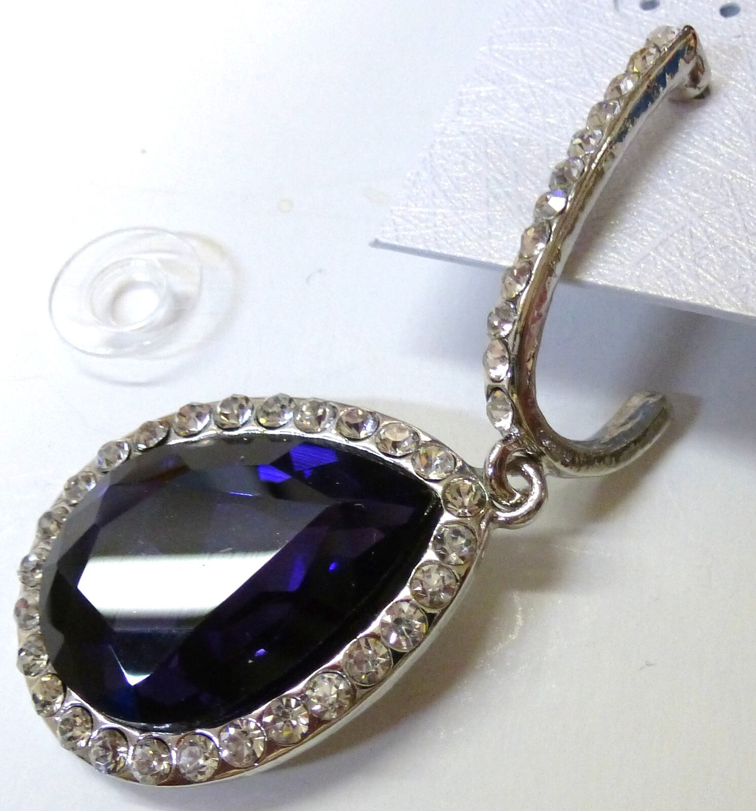 earrings – purple surrounded by rhinestones 2 1/2 inches