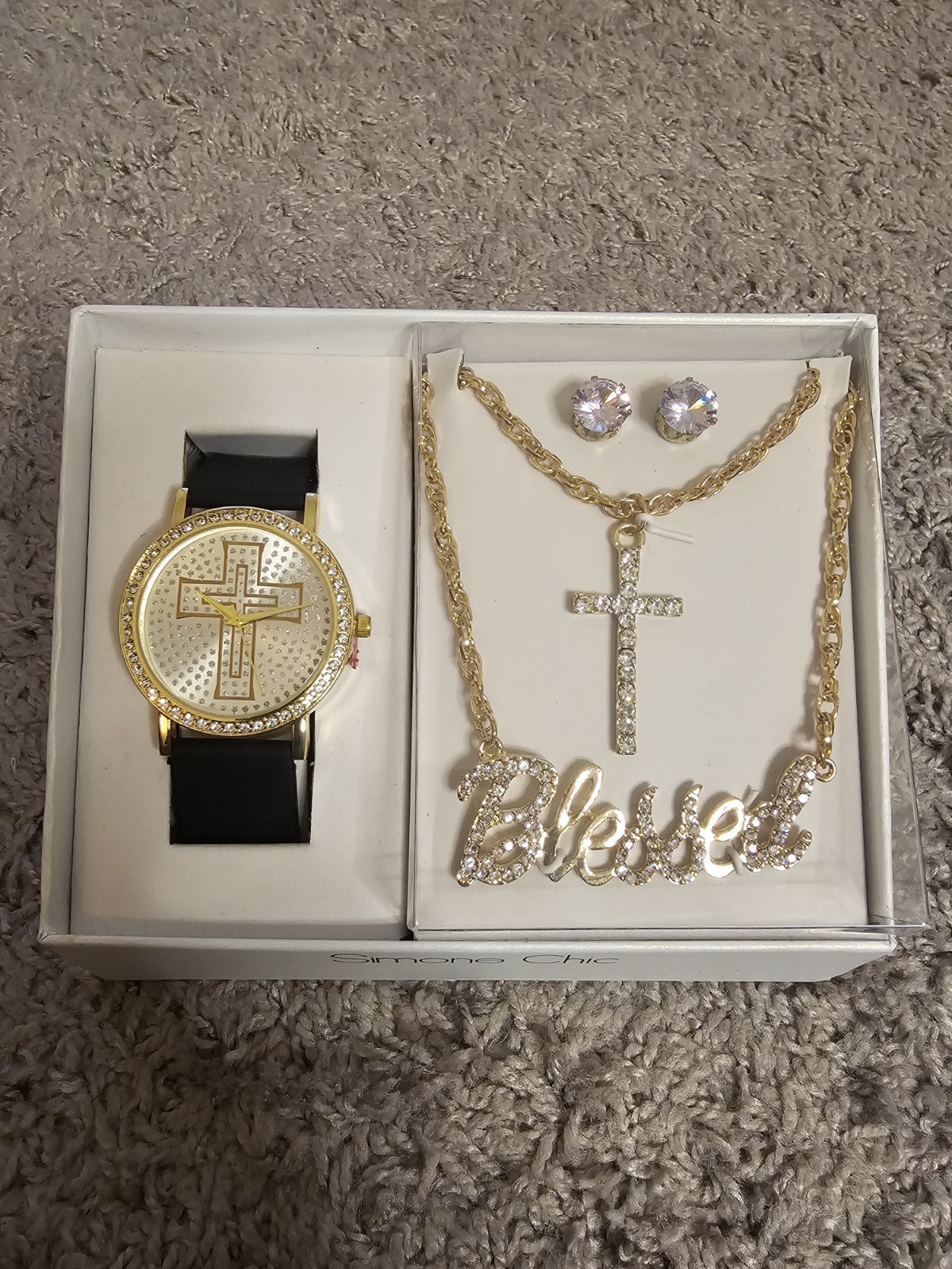 Brand new never been worn. Necklace says blessed, has a watch and earrings.