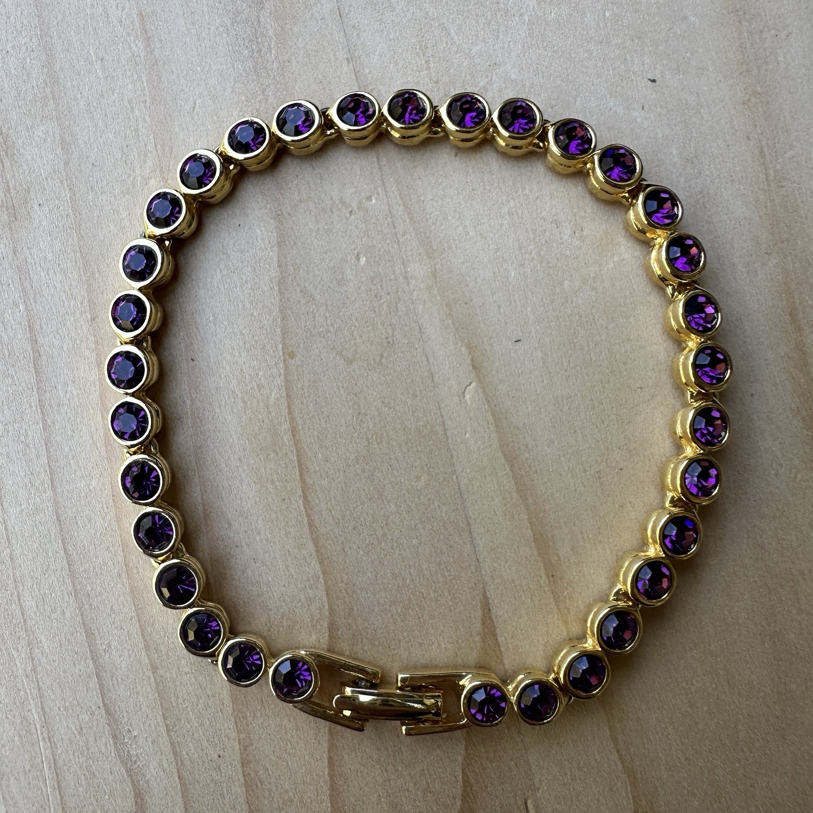 VTG Tennis Style Bracelet 7.25 Fold-Over Clasp Purple Crystals Yellow Gold Plate