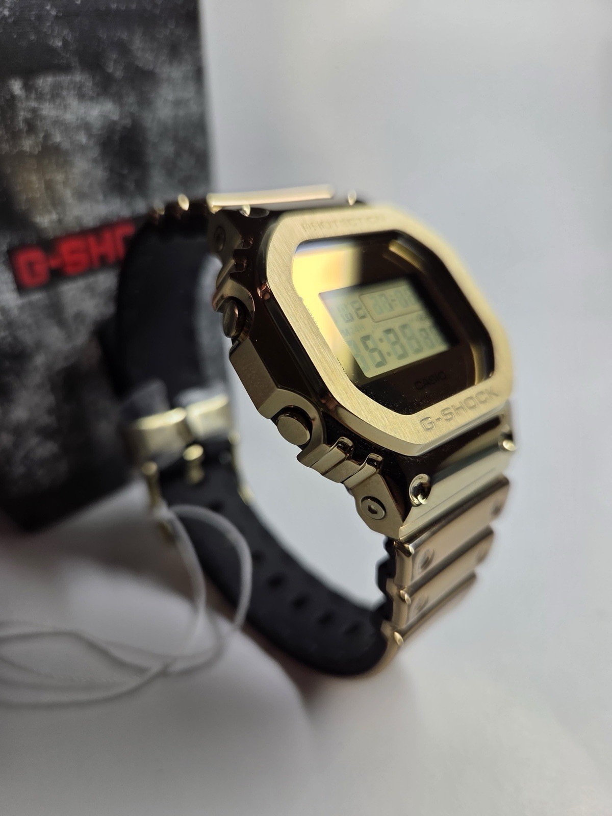 Casio G-Shock GM-5600YMG-9 Gold Metal G-Steel Digital Watch Brand New