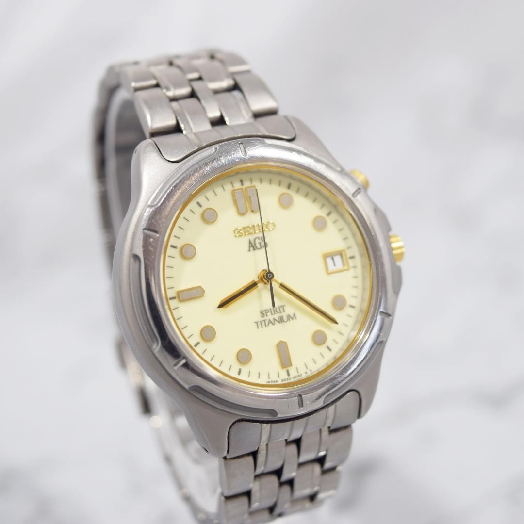 1996 SEIKO Spirit AGS Titanium watch with date display, non-functional.