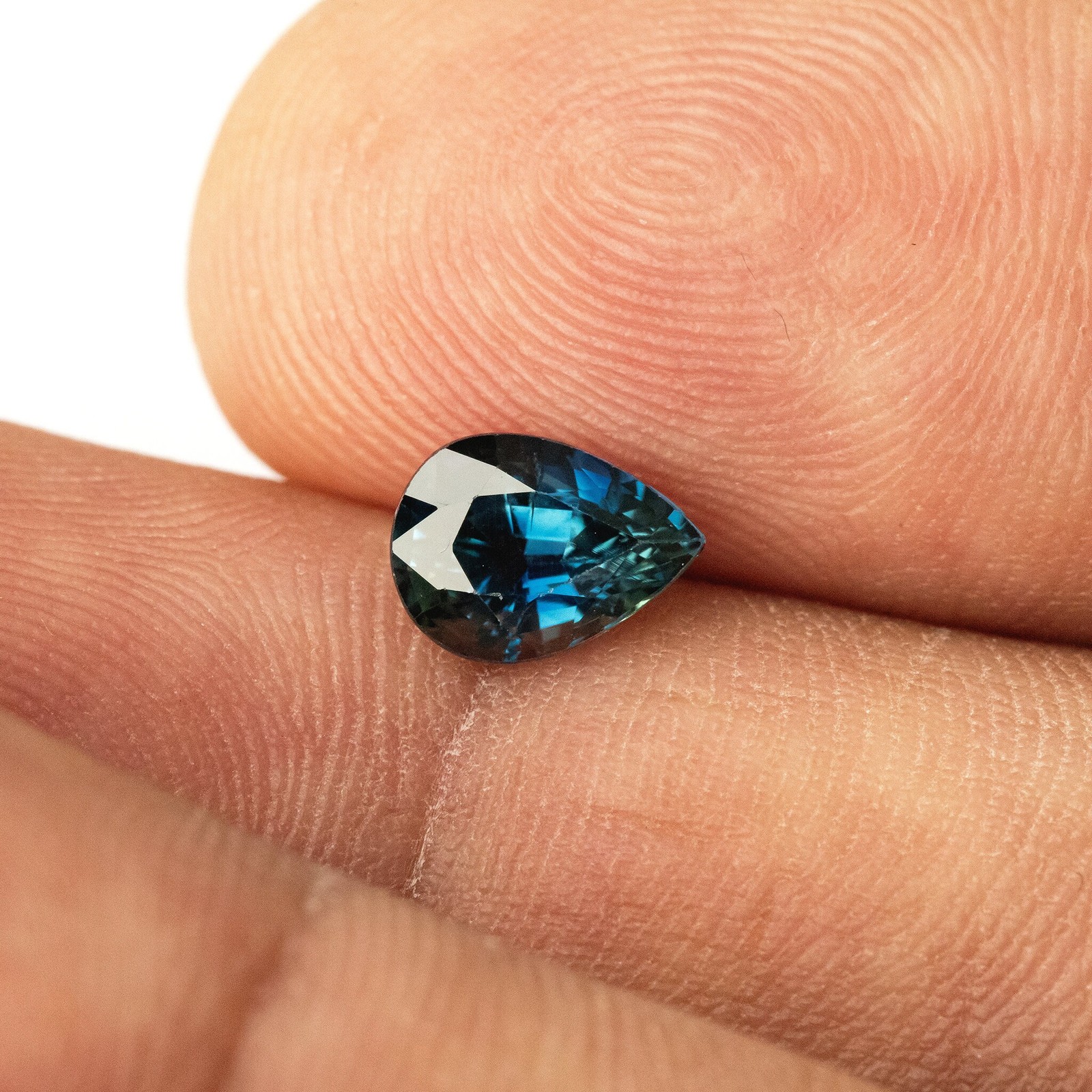 1.35ct Pear Shape Heated Natural Sapphire in Teal Green Peacock Blue Color