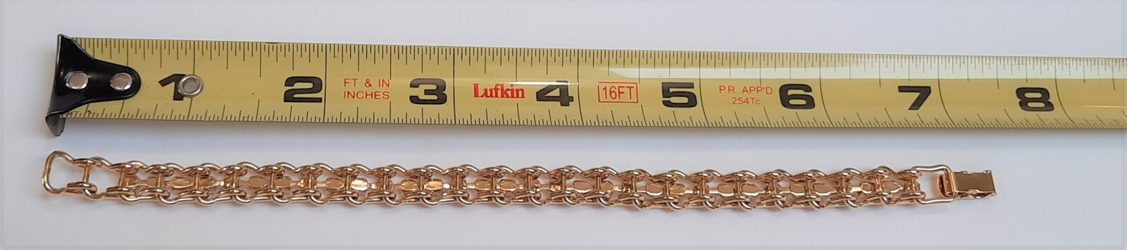 Vintage Rhinestone & Gold Tone Tennis Bracelet 7.25in Fold-Over Clasp