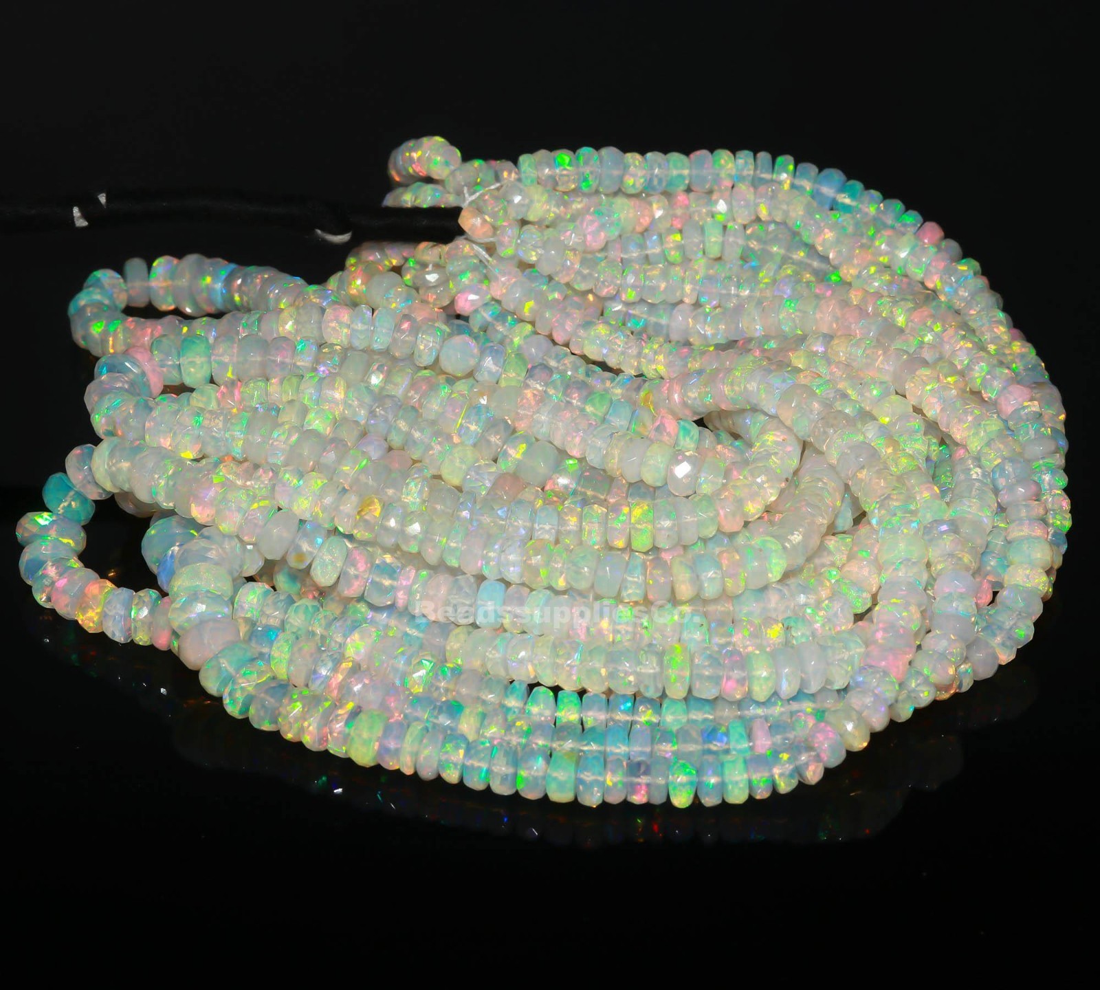 Faceted Ethiopian Opal Rondelle Beads: AAA+ Welo Opal