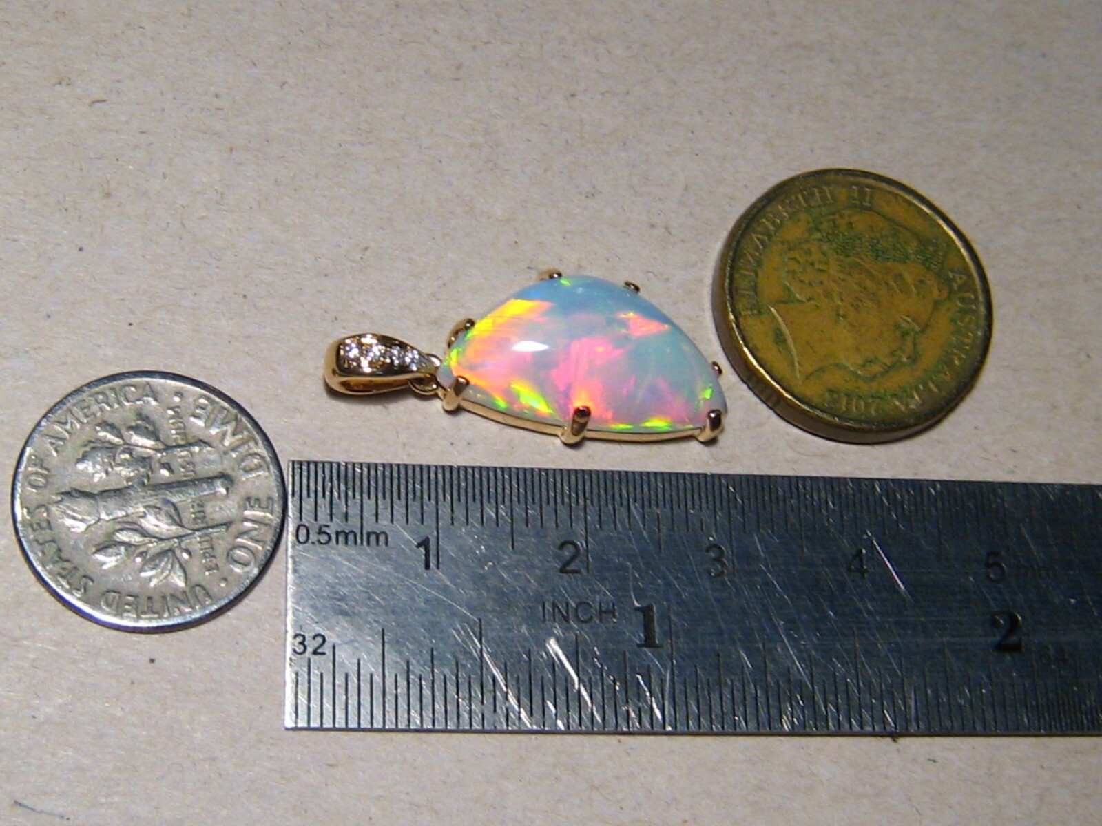 5.1 ct. Ethiopian Gem Opal and Diamond Pendant , 18 k Yellow Gold