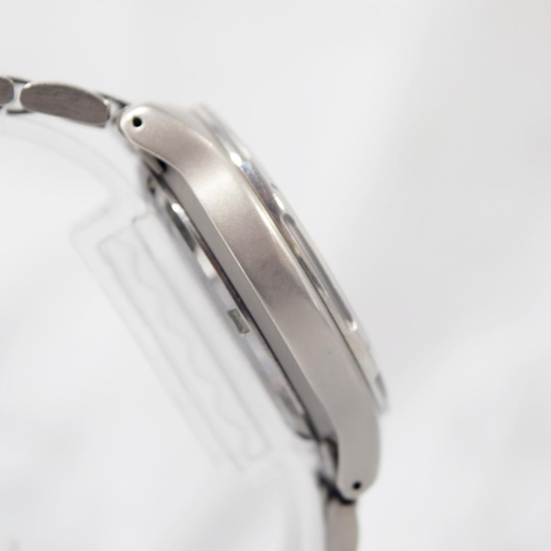 1996 SEIKO Spirit AGS Titanium watch with date display, non-functional.