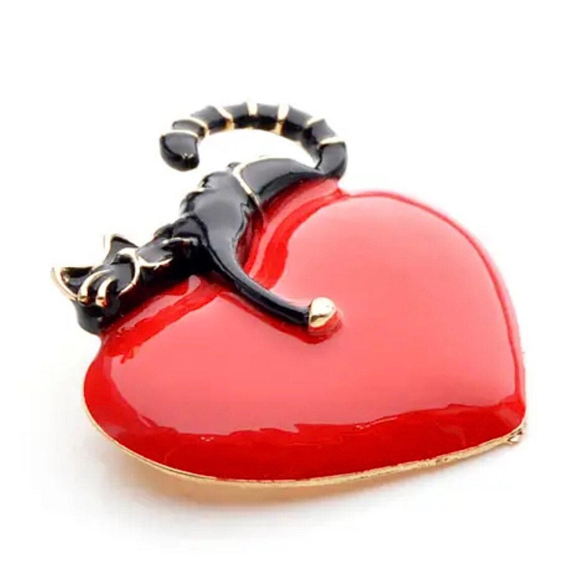 Rich red, shiny heart with comfy cat resting on top. Puffed up. Pin, brooch.