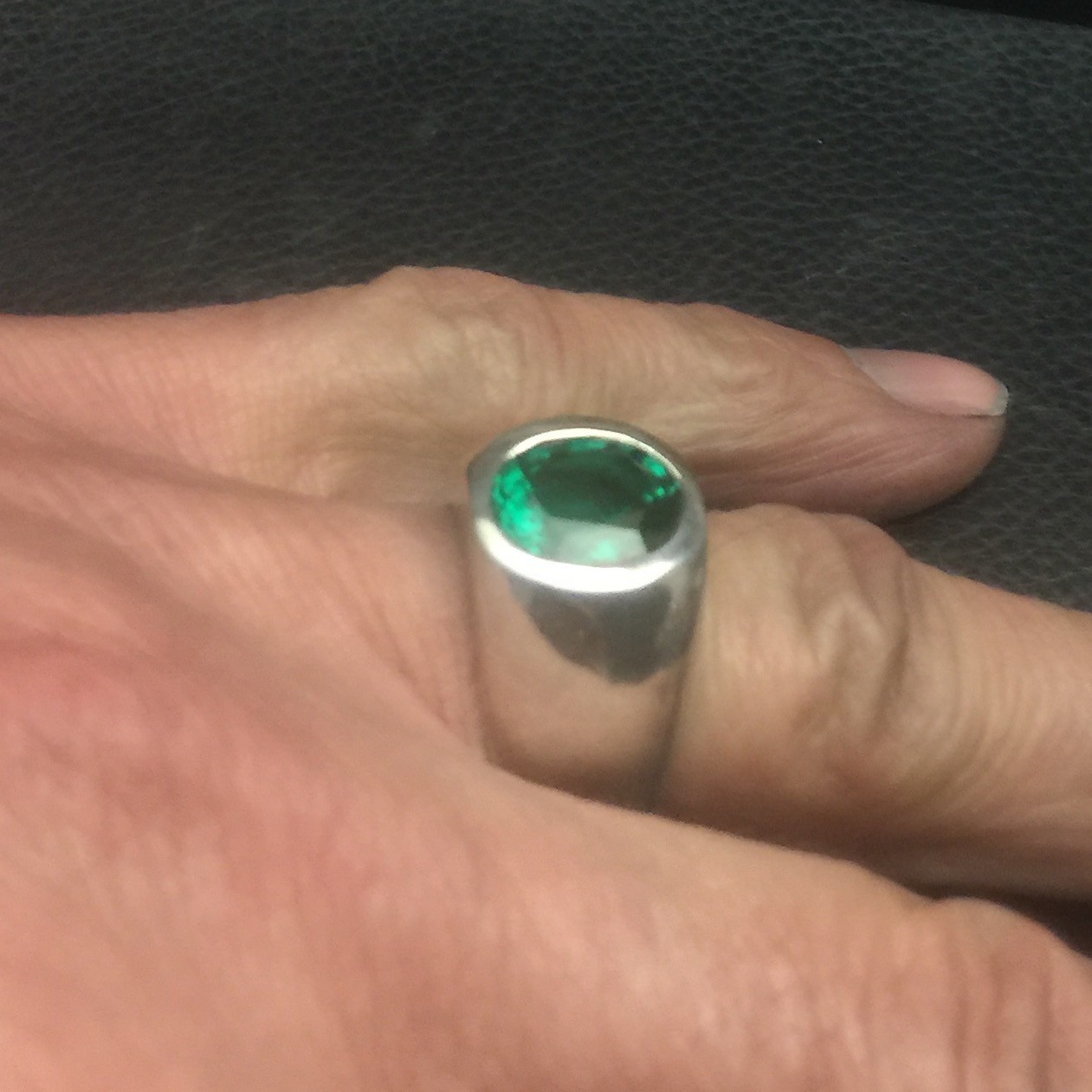 MJG STERLING SILVER RING. HEAVY. 12 x 10mm OVAL LAB EMERALD. SIZE 9.5
