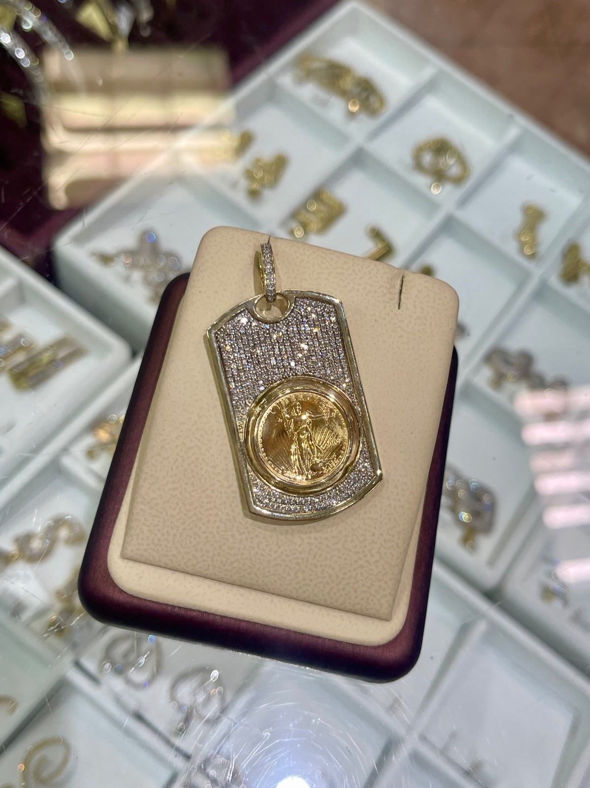 10kt dog tag bezel with a genuine 22kt 1/10th oz American Eagle coin
