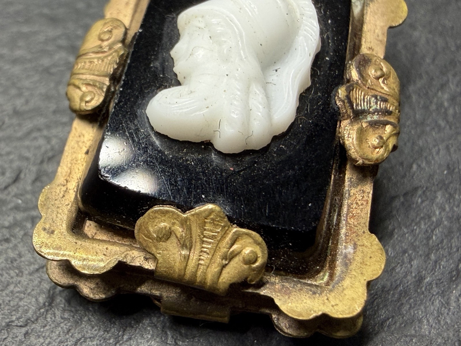 ANTIQUE METAL FOB / PENDANT WITH BLACK & WHITE PROFILE N885