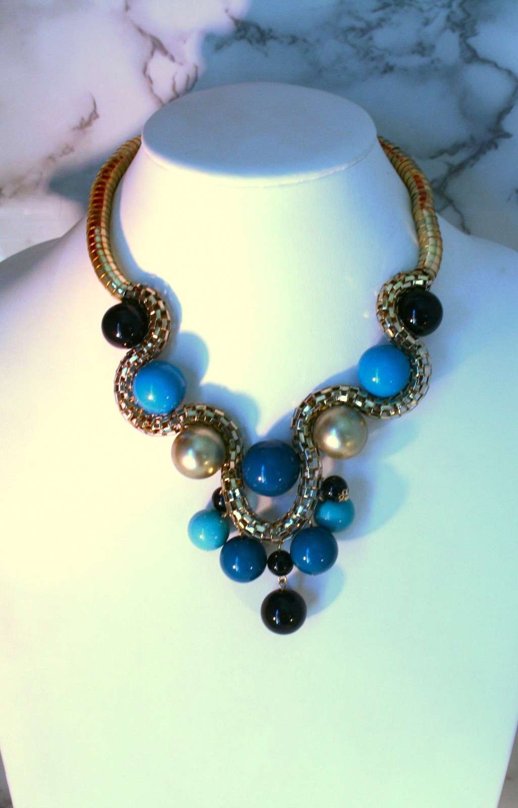 Gold tone large blue, black, gold beads statement necklace 18″ + 2″ & earrings