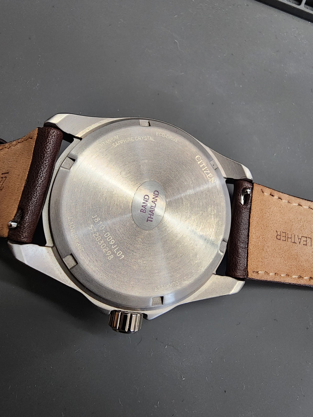 Citizen AW1840-09L Brycen Titanium Case Eco-Drive Leather Strap Blue Dial Watch