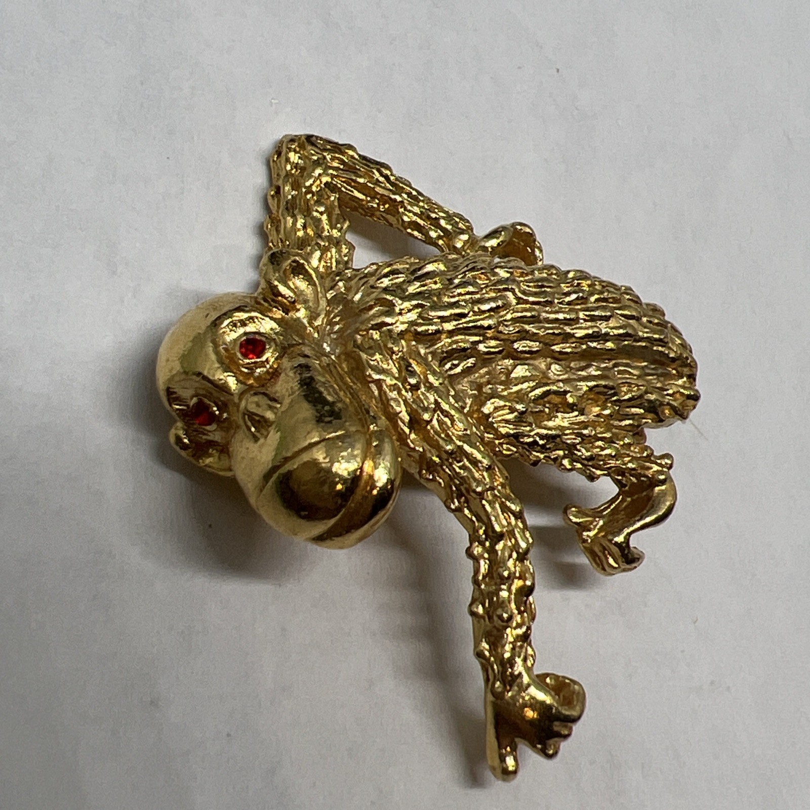 Vintage Signed Gerry’s Gold Tone Monkey Ape Figural Brooch Textured Red Rhinesto