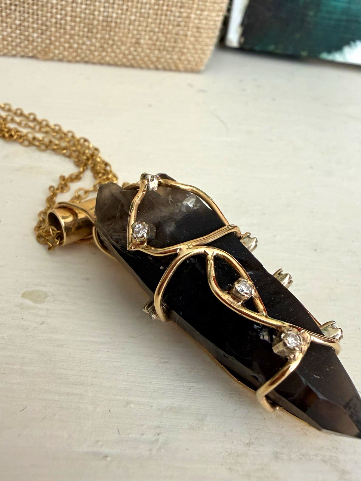 Terminated smoky quartz,wire wrapped in gold with diamond accents, pendant only