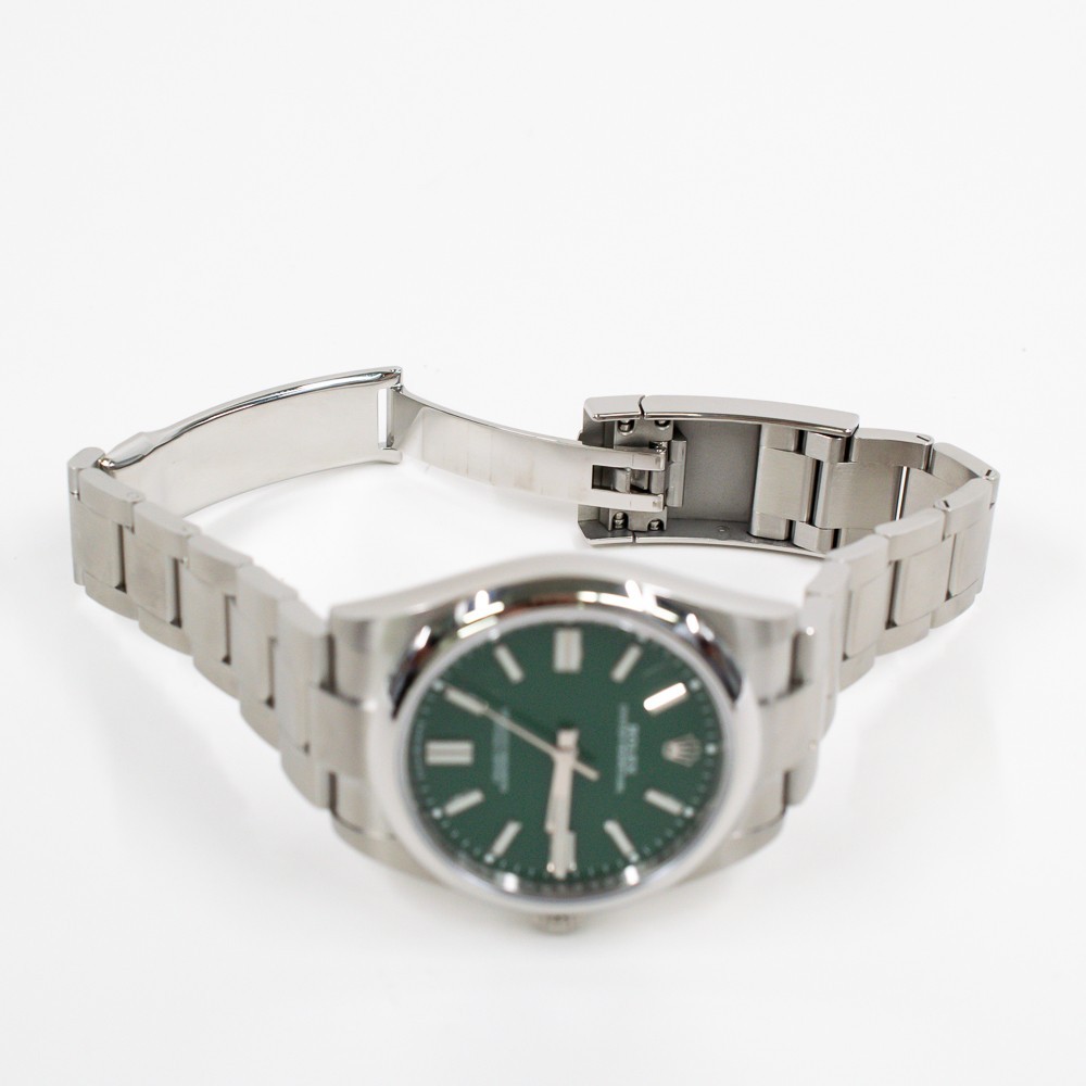 Rolex Oyster Perpetual 41 124300 Green Dial Stainless Steel Box & Papers Mint