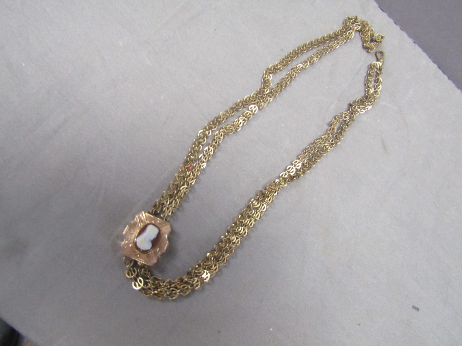 ANTIQUE VICTORIAN LADIES WATCH CHAIN WITH 1OK GOLD CAMEO SLIDE & G.F. CHAIN*