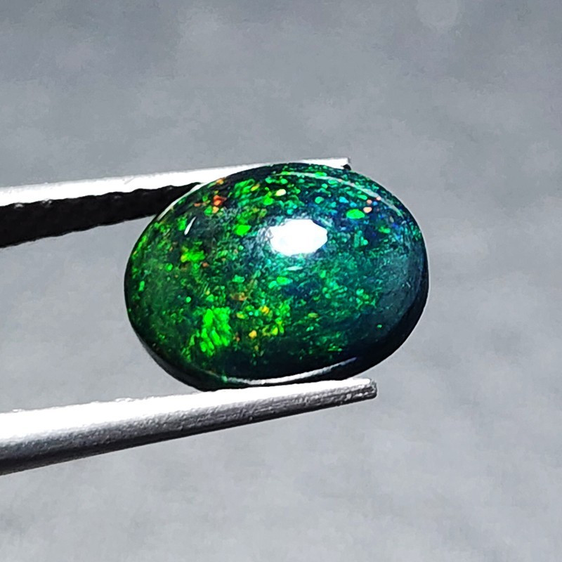 Ethiopian Welo Black Opal AAA+ Oval Cabochon Strong Green Play Loose 1.20Ct Gem