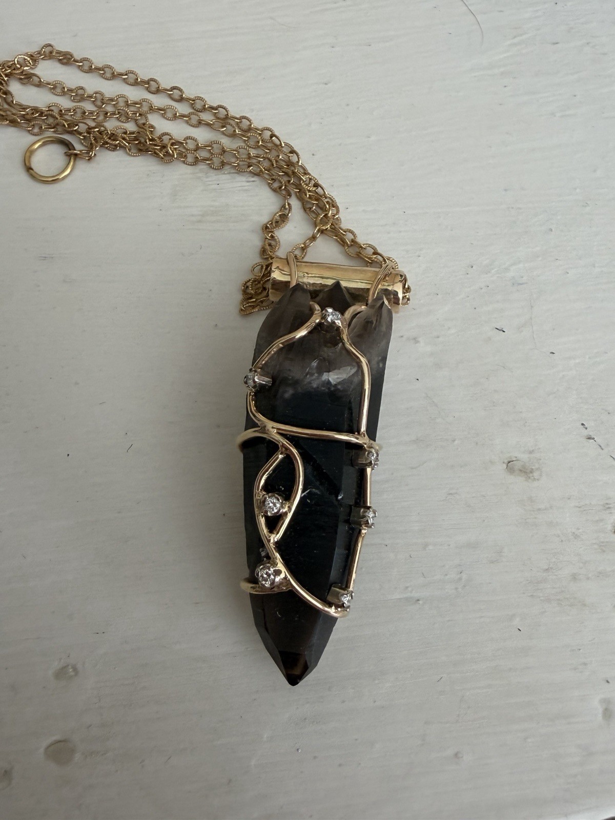 Terminated smoky quartz,wire wrapped in gold with diamond accents, pendant only