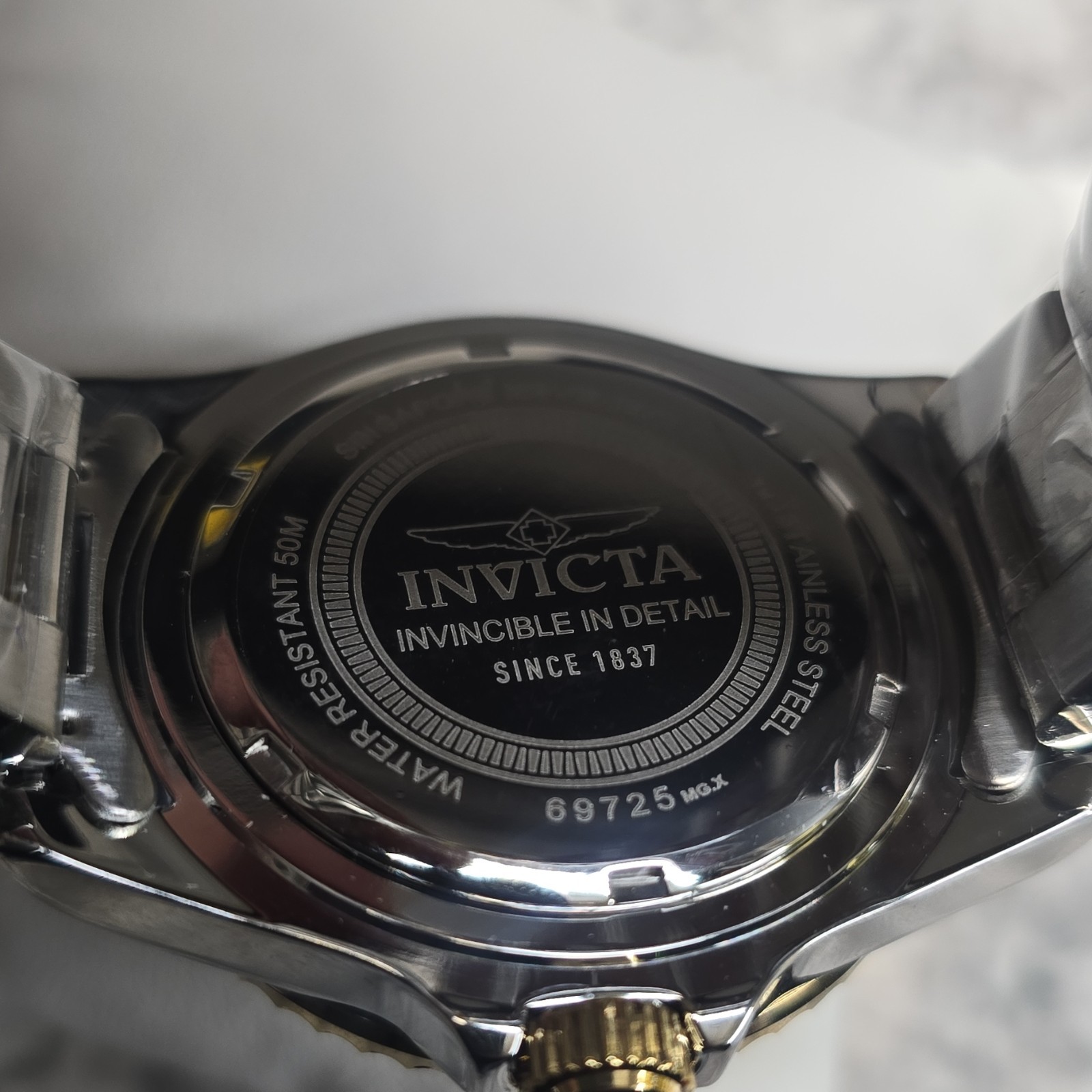 Invicta Men’s Specialty Two-Tone Stainless Steel Gold Dial Analog Wristwatch 50m