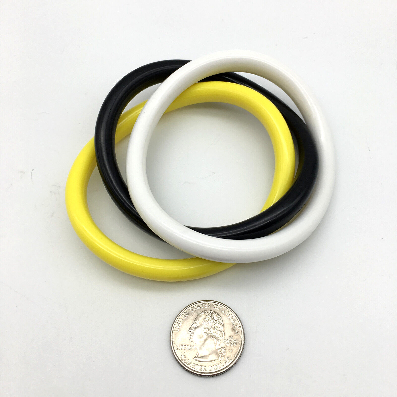 Lot of 3 Bracelets, Yellow, White & Black Lucite Wavy Bangle Bracelets