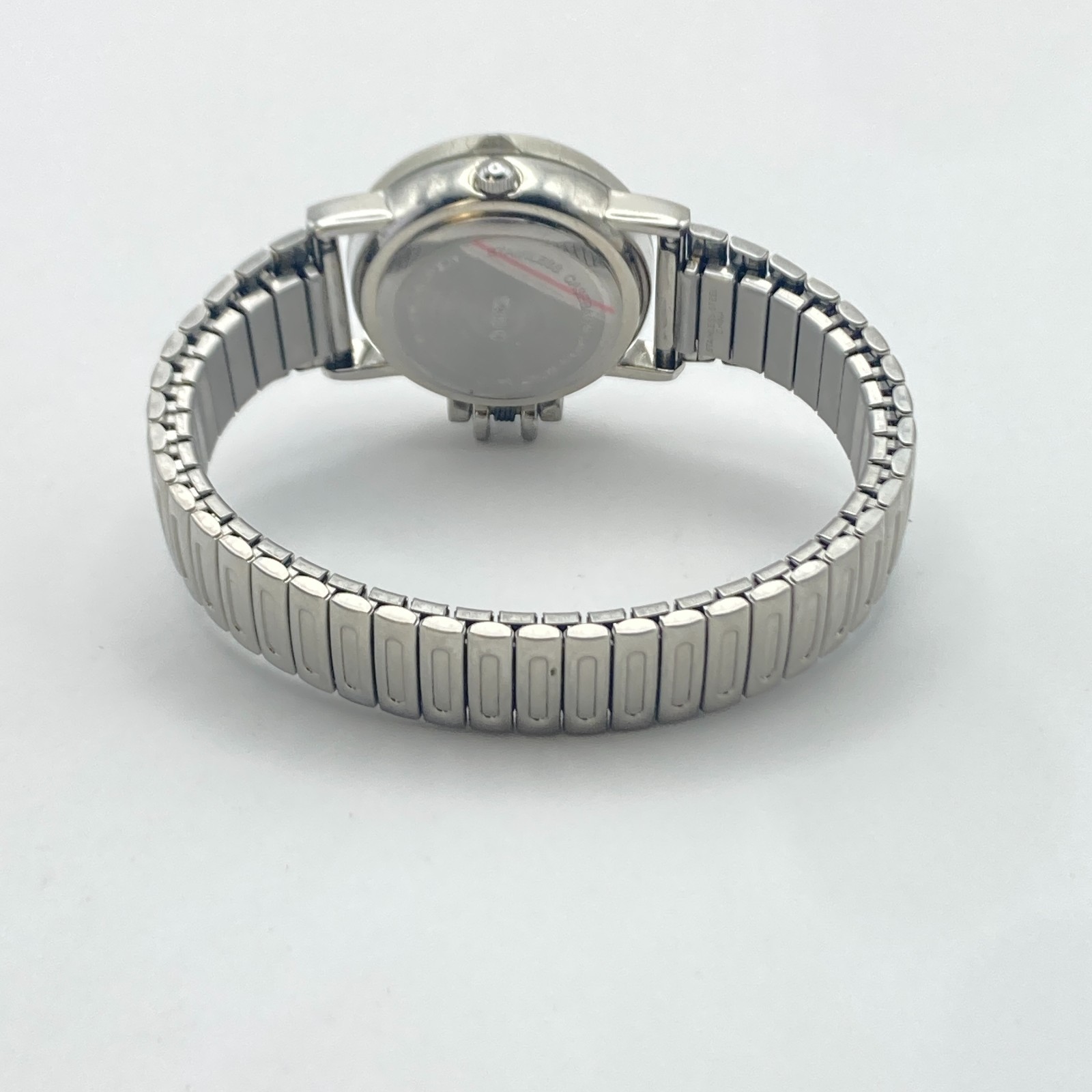Accutime Hidden Dial Women’s Watch Monkey Silver Tone Stretch Band New Battery