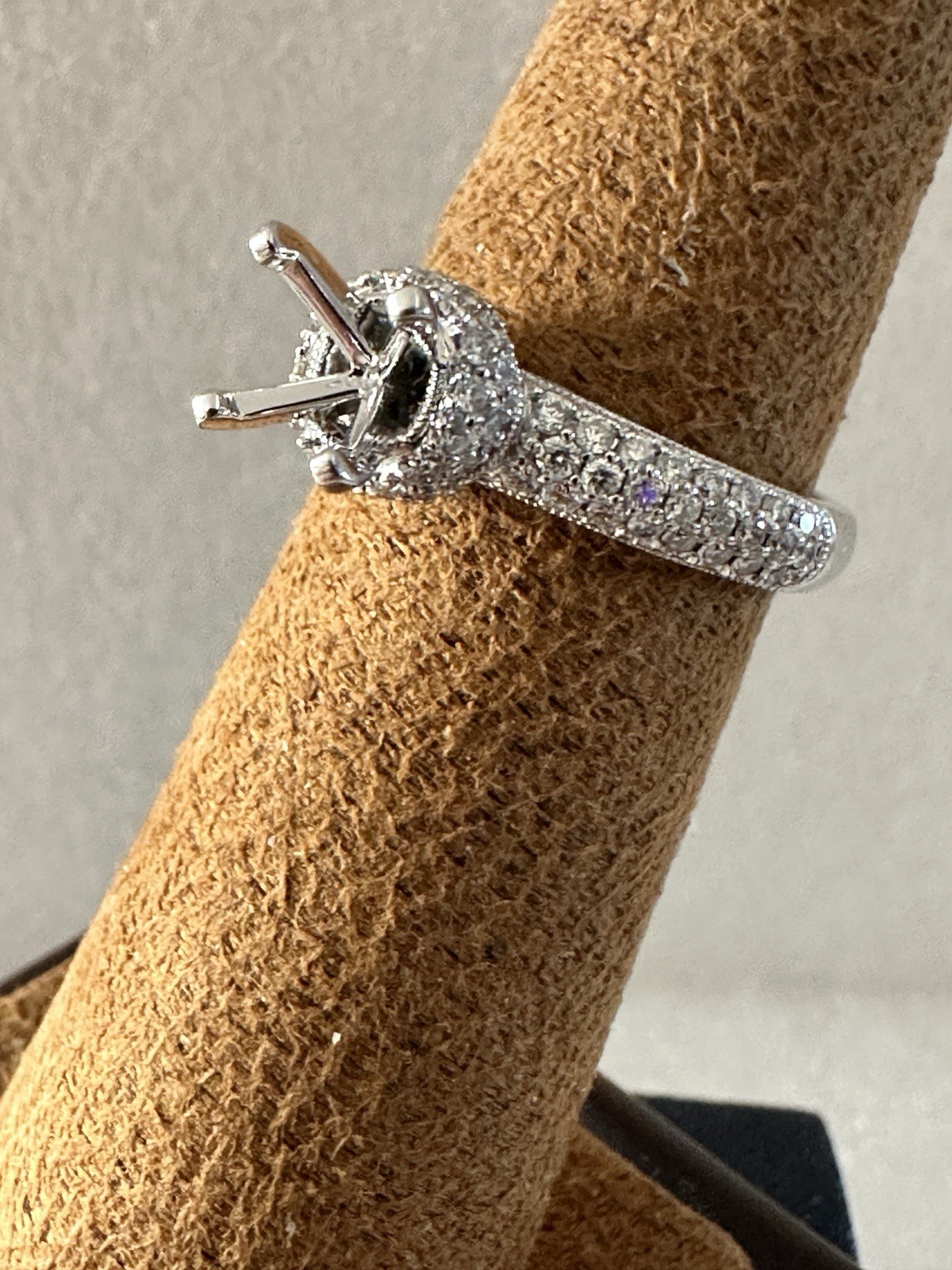 14kt,white gold semi mount ring with 0.62ct, VS2 clarity size 6, 4.40 grams.