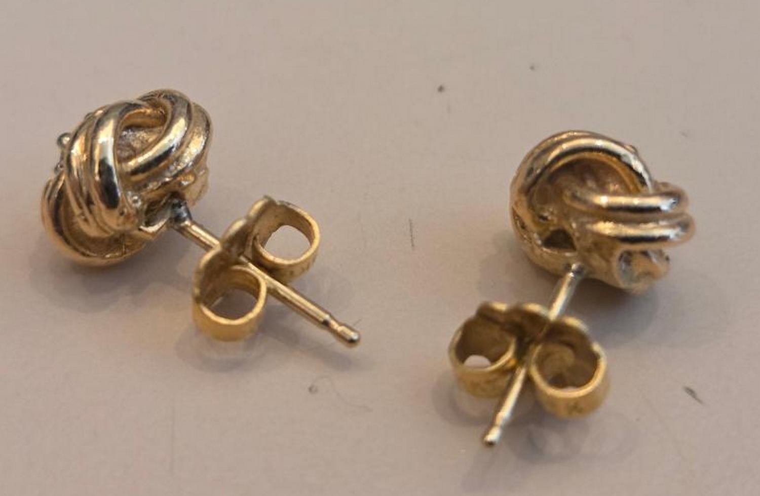 Nice 14k gold love knot post earrings with tiny diamond, 1980-2000s