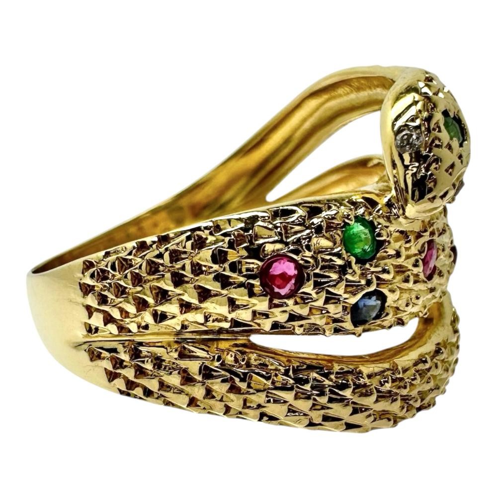 US 6.4 Snake motif Ruby Total 0.16ct sapphire Total 0.09ct Emerald Total of …