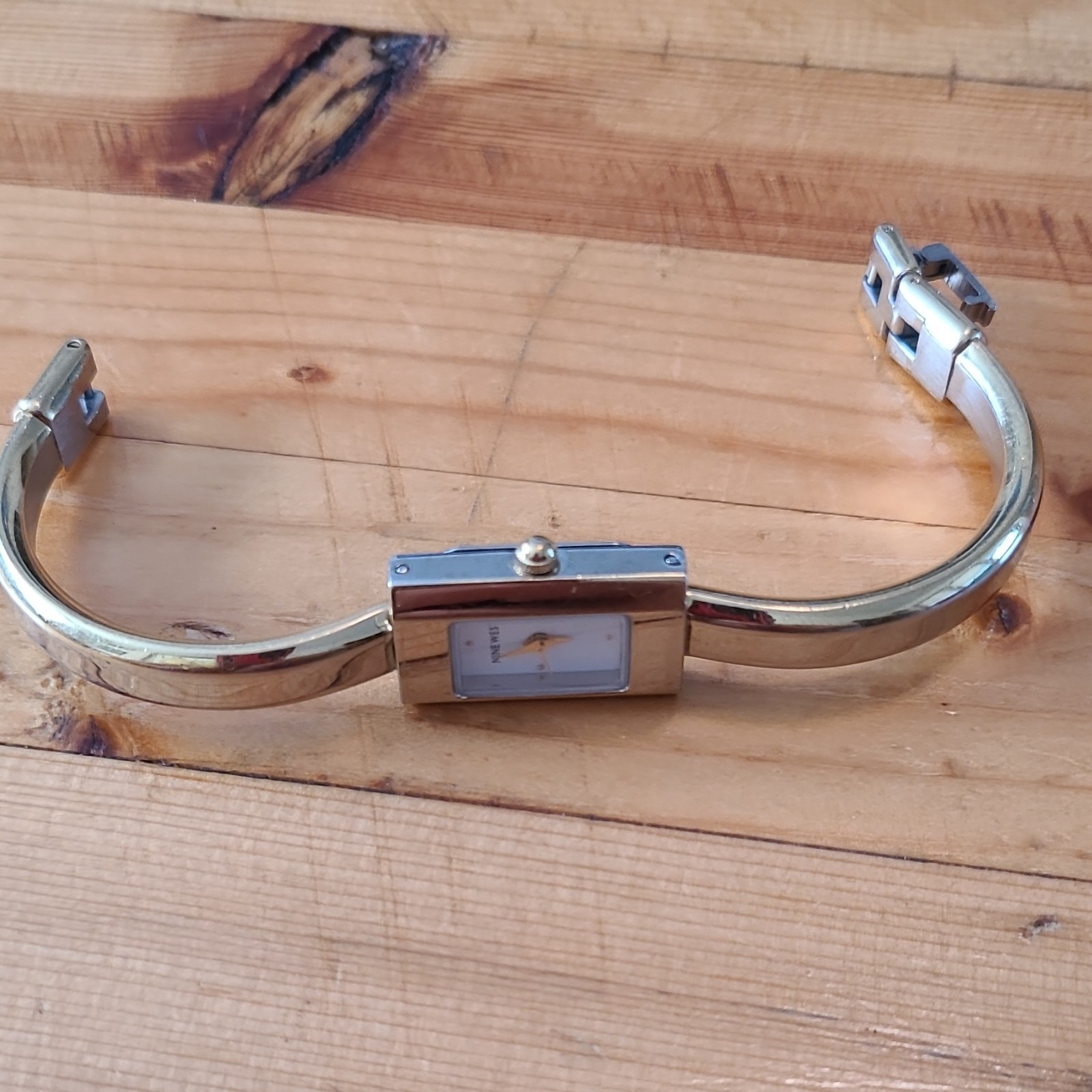Nine West Women’s Dress Quartz Watch Gold Bangle Rectangular Case White Dial