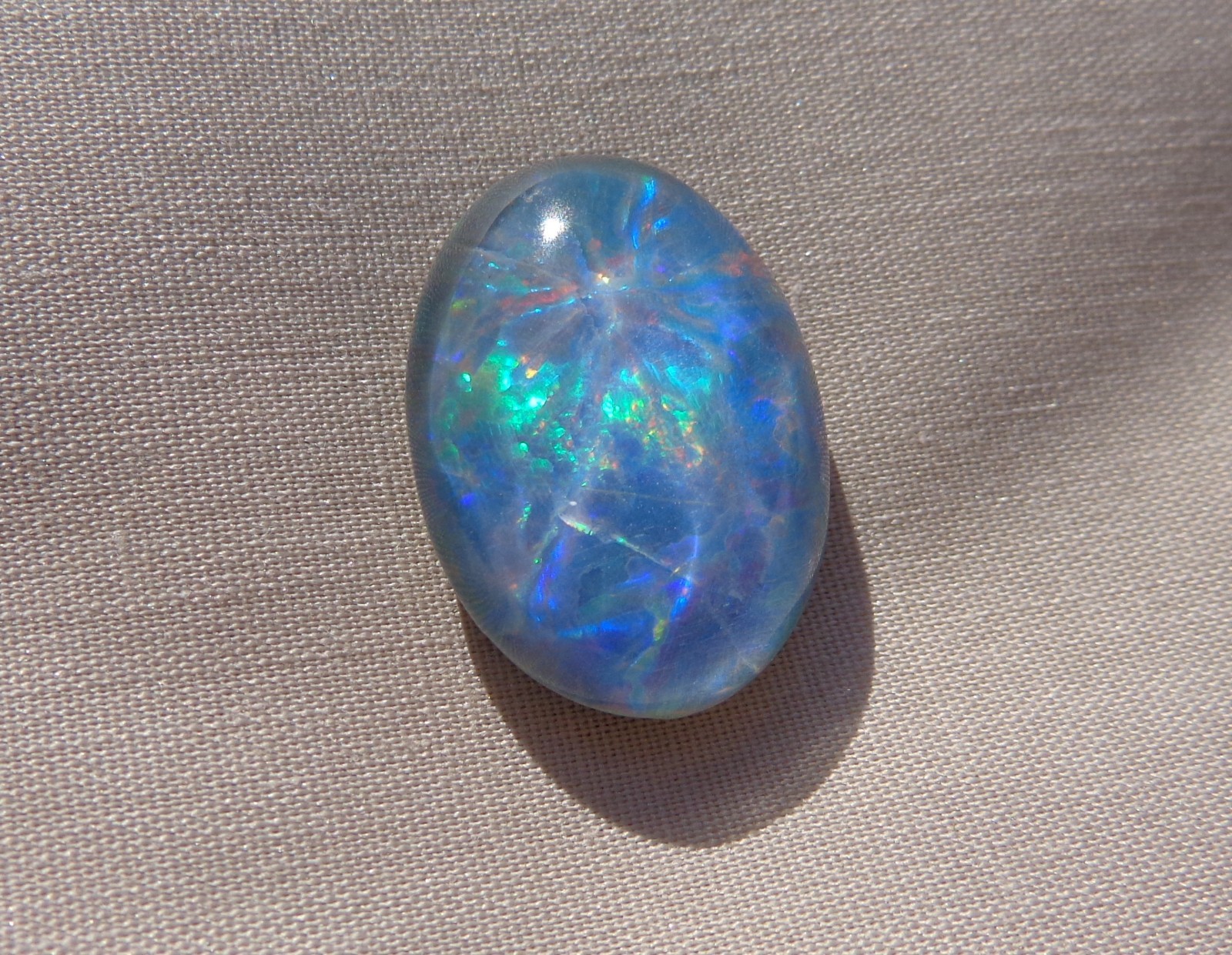 Spencer Idaho Opal Triplet 15X20mm with a Blazing Green Fire in a Galaxy Pattern
