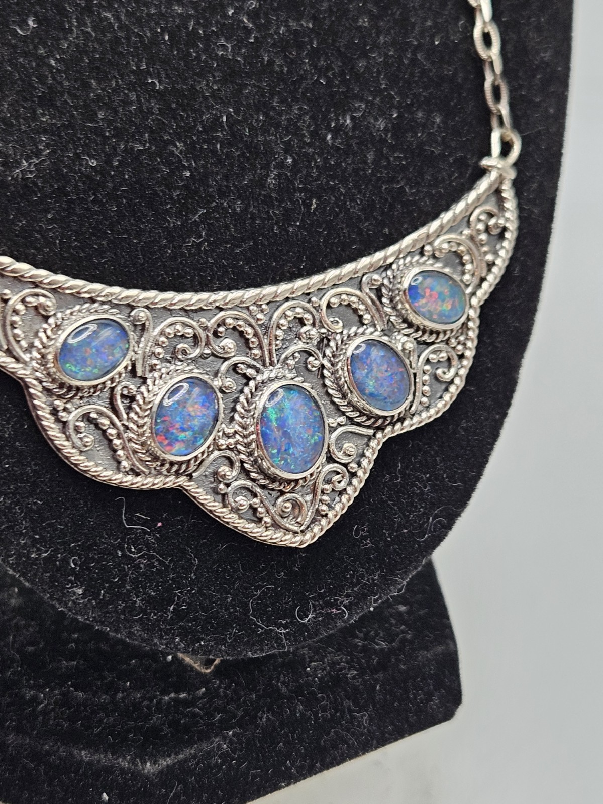 Sterling Silver Bib Style Necklace With 5 Oval Bezel Set Opals. 20″ Marked. 925.