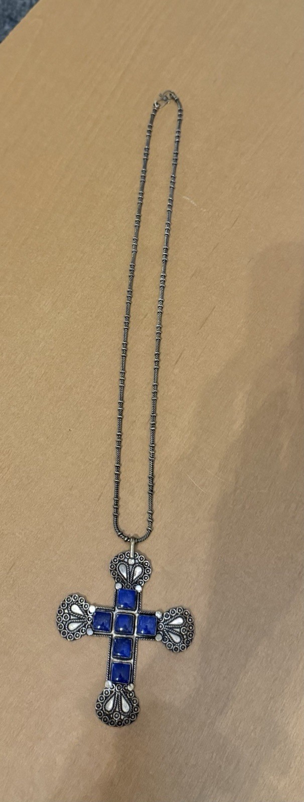 Silver Toned Necklace with Silver Toned and Blue Stone Cross Pendant 29 1/2″