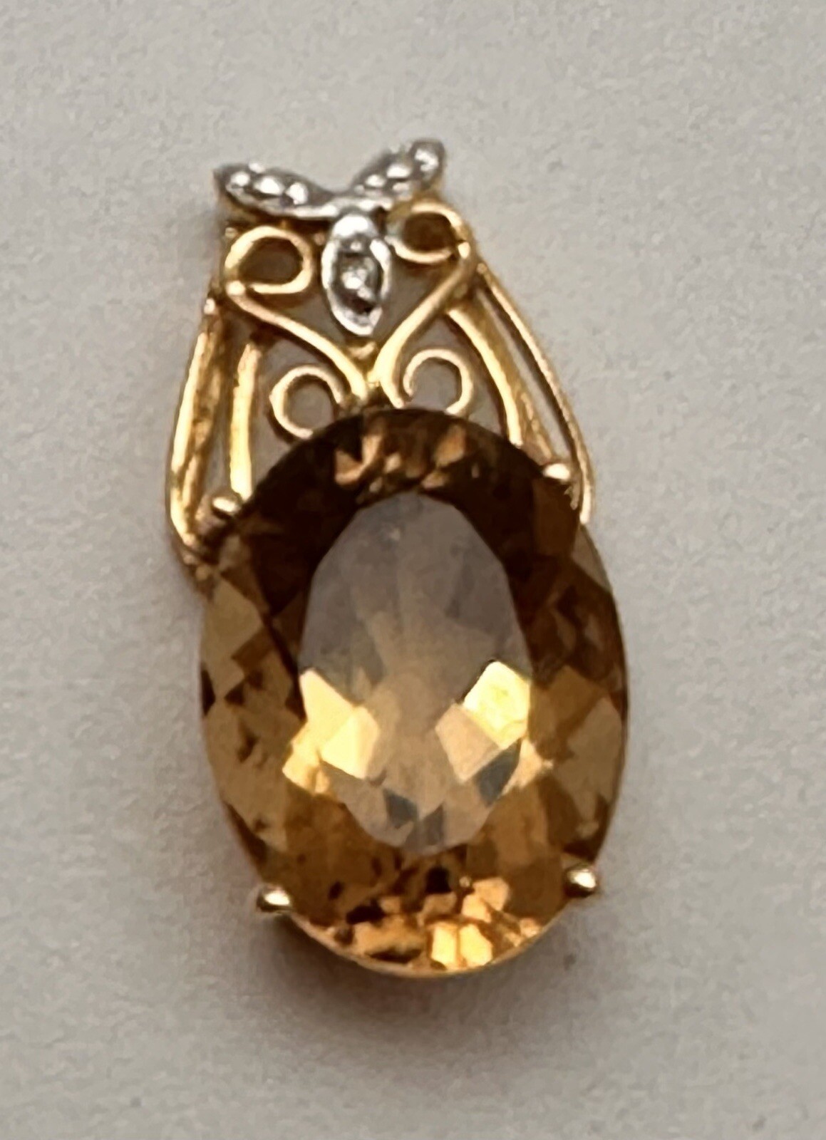 14k Yellow Gold 12mm x 16mm Oval Golden Topaz & Diamond 1/2″ x 1″ Pendant