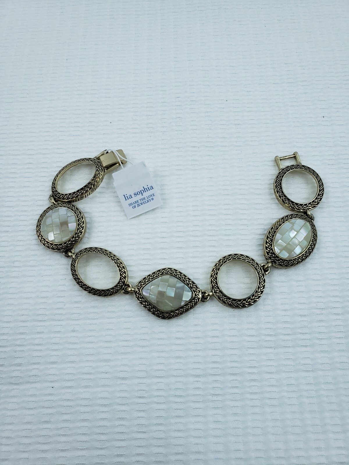 Lia Sophia Flexible Oval Linked Round Fold Over Closure Silver Bracelet 9″ Long