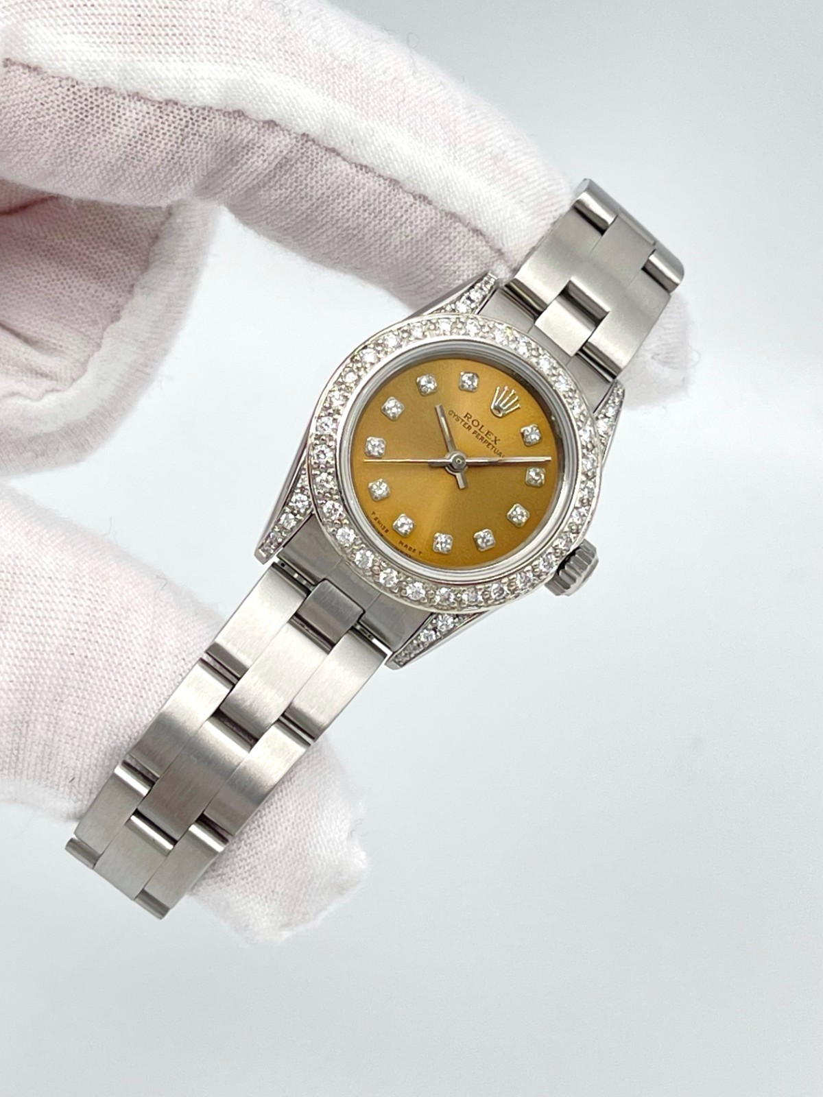 Rolex Oyster Perpetual 67180 24mm Salmon Dial Diamond Bezel Diamond Lugs Box