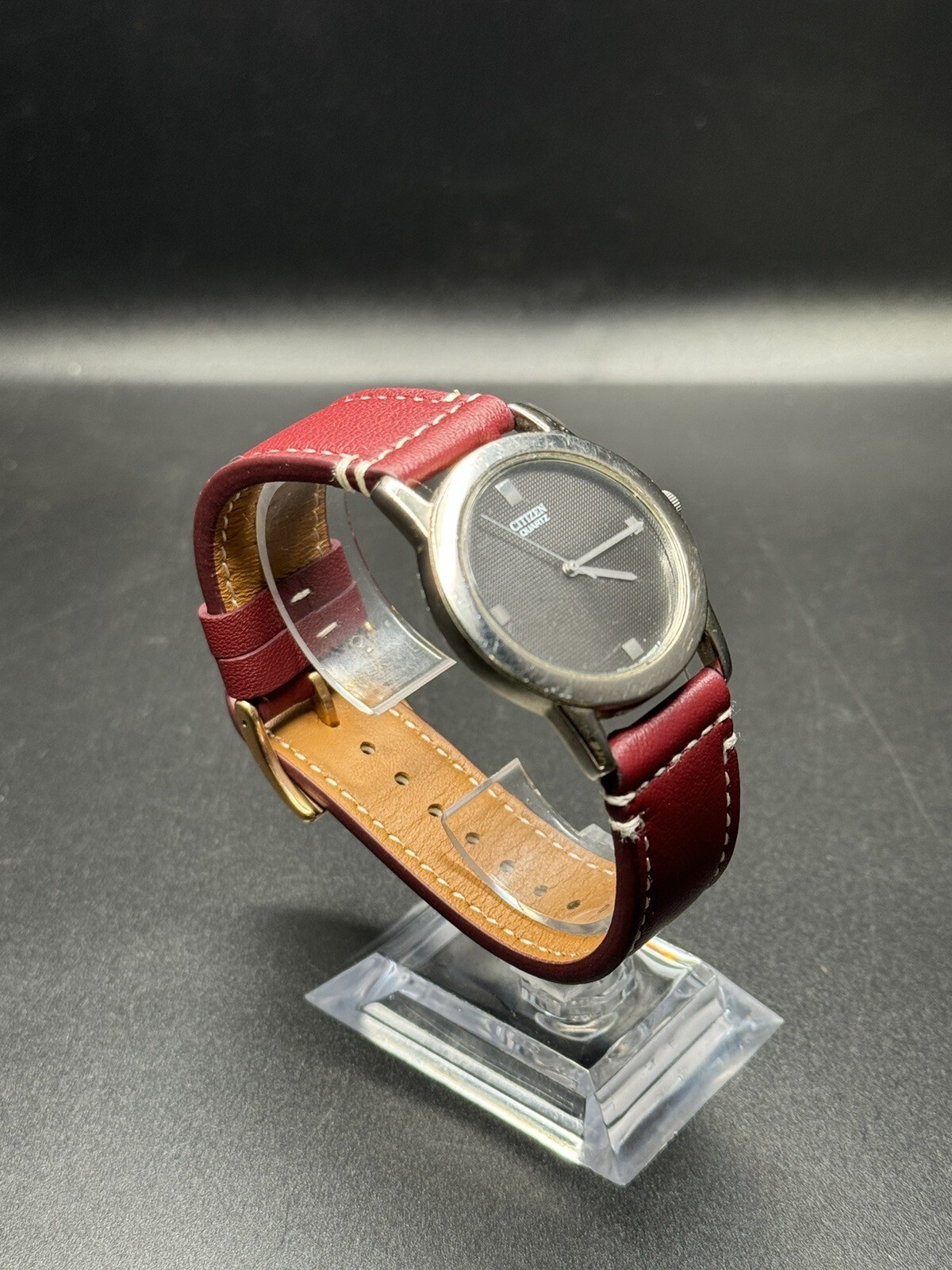 Citizen Quartz Silver Tone Dark Gray Dial Number-Less Watch Burgundy Strap