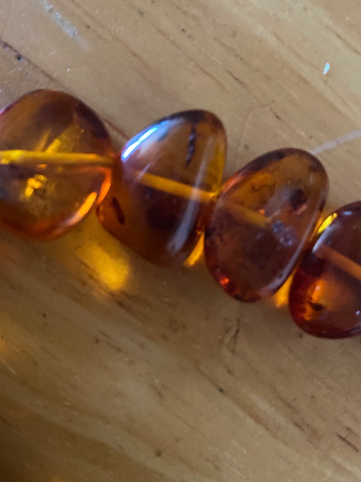 Braun amber necklace 21″ long with amber lock. New. Latvia.
