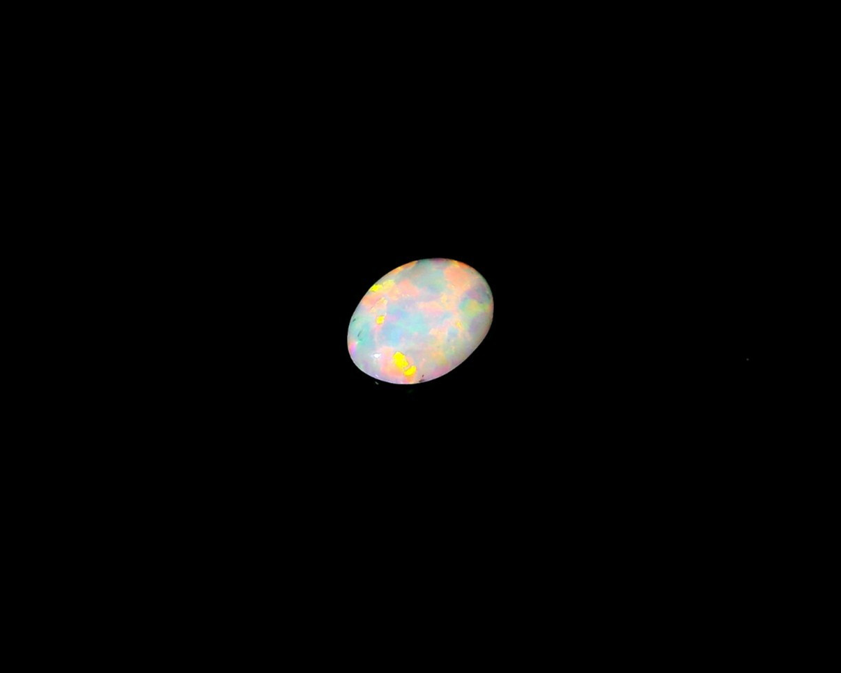 0.36ct Oval Shape White Blue Multi-Color Opal 7 x 5 mm