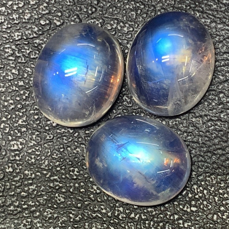 AAAAAA Quality Rainbow Moonstone Blue Fire Oval Shape Cabochon Size 10X12 MM